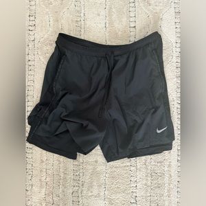 Nike men’s running shorts, large